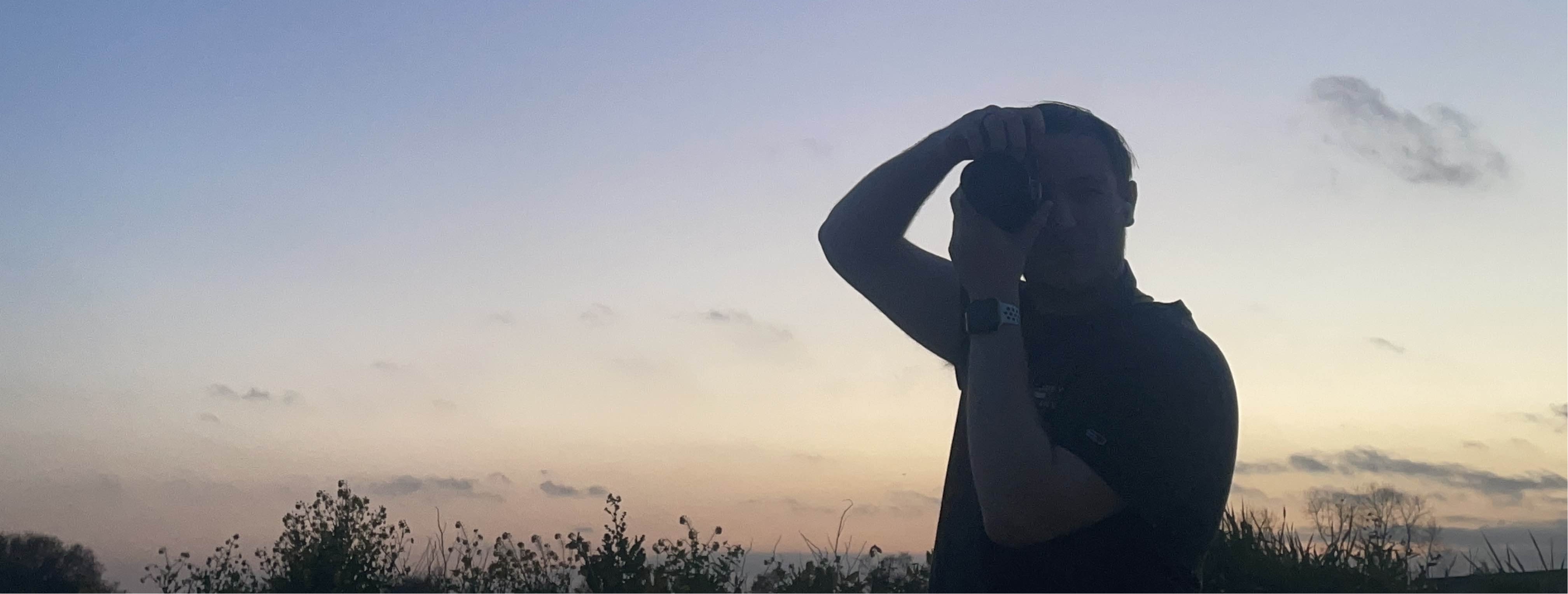 Luhan prenant une photo d'un paysage